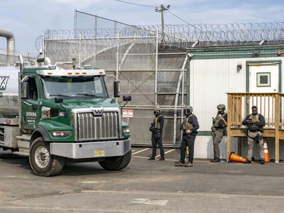 May 27, 2026, Newark, New Jersey, USA: ICE agents wearing bullet-proof vests allow a sewage truck to exit the Delaney Hall ICE detention center. Detainees inside continue their hunger and labor strike over inhumane conditions and due process violations. Supporters of the detainees are nearby. Newark USA - ZUMAd155 20260527_znp_d155_016 Copyright: xSuexDorfmanx