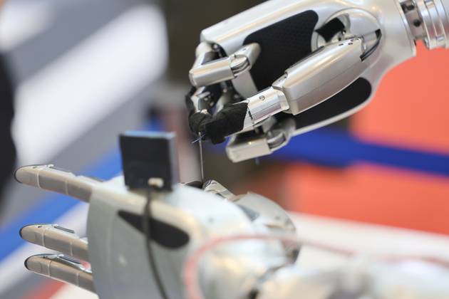 (260528) -- TIANJIN, May 28, 2026 -- A robot threads a needle at the World Intelligence Expo 2026 in Tianjin, north China, May 28, 2026. Themed Intelligence: Extensive Development Space, Sustainable Growth Driver, the World Intelligence Expo 2026 kicked off here on Thursday. ) CHINA-TIANJIN-WORLD INTELLIGENCE EXPO (CN) LixRan 
