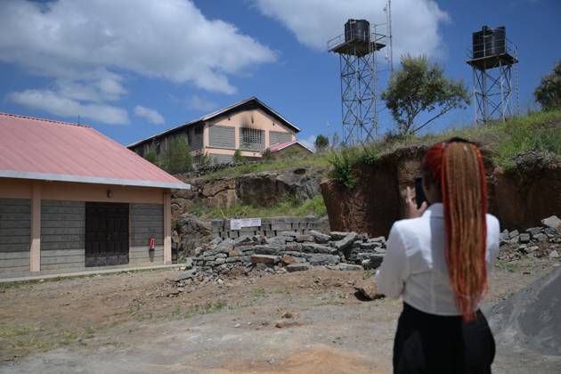 (260528) -- NAKURU, May 28, 2026 -- This photo taken on May 28, 2026 shows the view of Utumishi Girls Academy, where a fire broke out earlier in Gilgil, Nakuru County, Kenya. The death toll from an early-morning fire in northwestern Kenya rose to 16 after six more students succumbed to their injuries, police confirmed on Thursday. The fire broke out at around 1:00 a.m. Thursday local time (2200 GMT Wednesday) while the students were asleep in the dormitory at Utumishi Girls Academy in Gilgil, Nakuru County, initially claiming 10 lives before the toll rose. Meanwhile, more than 70 remain hospitalized with injuries of varying severity. A police report said that most of the injured are currently in stable condition. The cause of the