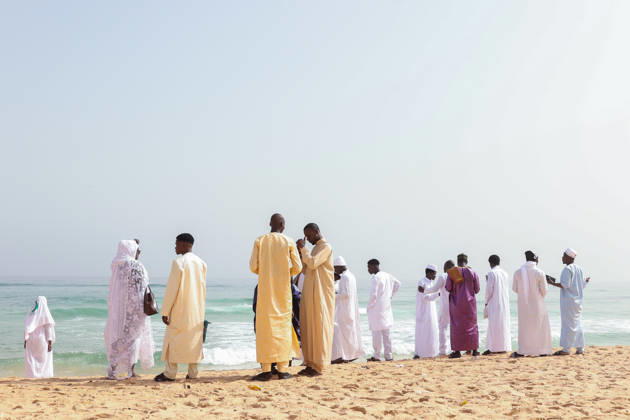 Eid al-Adha prayer on the beach in Dakar DAKAR, SENEGAL - MAY 28: Followers of the Layene order perform the Eid al-Adha prayer dressed in white on the beach in Dakar, Senegal where the first day of Eid al-Adha is being observed today on May 28, 2026. In the Yoff district of the capital Dakar, thousands gathered on the beach around the tomb of Seydina Limamou Laye, the founder of the Layene order, for the Eid prayer. Cem Ozdel Anadolu Dakar Senegal. Editorial use only. Please get in touch for any other usage.  Copyright: x2026xAnadoluxCemxOzdelx