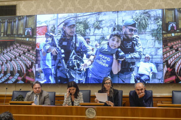 IPA85160345 - Rome Senate presentation of UN special rapporteur s report on the occupied Palestinian territories, pictured Dario Carotenuto Laura Boldrini Francesca Albanese Peppe De Cristofaro in the background images from Gaza  Copyright: xSTEFANOxCAROFEIx xSTEFANOxCAROFEIx xFOTOGRAMMAx 85160345