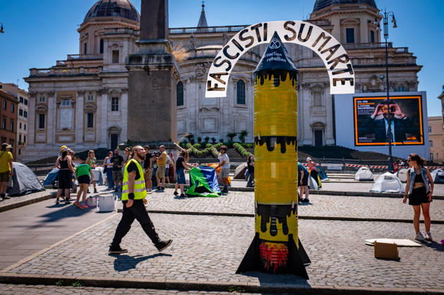 May 30, 2026, Rome, Rm, Italy: Extinction Rebellion activists are launching a 24-hour rally in Piazza dell Esquilino, just days before the 80th anniversary of the Italian Republic on June 2nd. They say: there is nothing to celebrate as long as rights, justice, and dignity continue to be denied. Oil extraction is imposed through violence and war to produce ever more energy, further increasing inequality. Activists assembled a rocket made of oil drums. It reads: Fascists on Mars. Rome Italy - ZUMAg256 20260530_znp_g256_013 Copyright: xMarcoxDixGianvitox