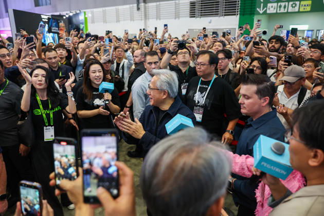 NVIDIA s CEO Jensen Huang visits COMPUTEX TAIPEI 2026 TAIPEI, TAIWAN - JUNE 3: Jensen Huang, the CEO of American multinational tech giant NVIDIA, applaud as he is surrounded by heaps of supporters and staff during his visit to the COMPUTEX TAIPEI trade show, in Taipei, Taiwan, on June 3, 2026. COMPUTEX TAIPEI is one of the world’s largest and most significant trade shows, featuring latest technologies, drones, data centres, Artificial Intelligence (AI) technologies, supercomputers, semiconductors products and other things from major international firms such as Nvidia, Intel, NXP and Foxconn. Daniel Ceng Anadolu Taipei Taiwan. Editorial use only. Please get in touch for any other usage.  Copyright: x2026xAnadoluxDanielxCengx