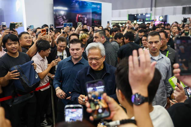 NVIDIA s CEO Jensen Huang visits COMPUTEX TAIPEI 2026 TAIPEI, TAIWAN - JUNE 3: Jensen Huang, the CEO of American multinational tech giant NVIDIA, signs autographs for fans as he is surrounded by heaps of supporters and staff during his visit to the COMPUTEX TAIPEI trade show, in Taipei, Taiwan, on June 3, 2026. COMPUTEX TAIPEI is one of the world’s largest and most significant trade shows, featuring latest technologies, drones, data centres, Artificial Intelligence (AI) technologies, supercomputers, semiconductors products and other things from major international firms such as Nvidia, Intel, NXP and Foxconn. Daniel Ceng Anadolu Taipei Taiwan. Editorial use only. Please get in touch for any other usage.  Copyright: x2026xAnadoluxDanielxCengx