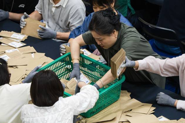 June 3, 2026, Seoul, South Korea: Poll workers sort mail-in ballots after the conclusion of voting in South KoreaÃ¢â‚¬â ¢s local elections on Wednesday, June 3, 2026 in Seoul, South Korea. Seoul South Korea  - ZUMAh163 20260603_znp_h163_023 Copyright: xJintakxHanx