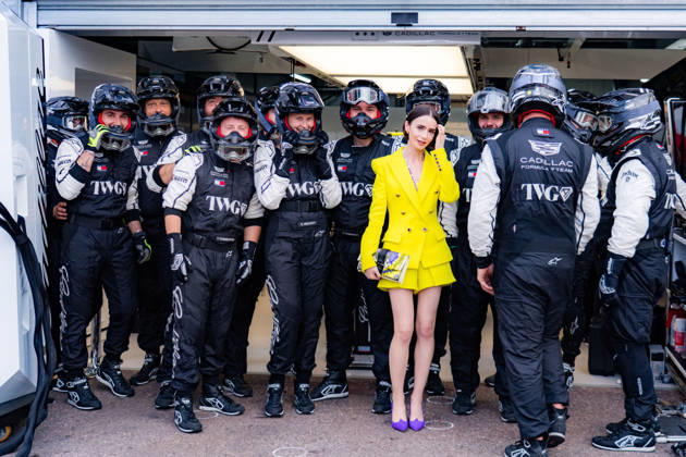 2026 Formula 1 Louis Vuitton Monaco Grand Prix Lily Jane Collins (GBR) (USA) filming the upcoming season of Emily in Paris in the pitlane at the Cadillac Garage with the pit crew on Media Day during the 2026 Formula 1 Louis Vuitton Monaco Grand Prix at the Monaco Street Circuit on June 4, 2026. Photo by ABACAPRESS.COM Monaco Monaco  Copyright: xABACAx
