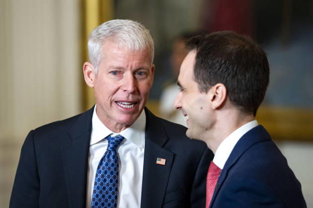 Secretary of Energy Chris Wright speaks with Director of the White House Office of Science and Technology Policy Michael Kratsios before an event honoring the winners of the Presidential AI Regional Challenge in the East Room of the White House in Washington, DC on Tuesday, June 9, 2026. The challenge recognizes both student and educator teams who designed AI-based solutions for community challenges.  WAP20260609374 BONNIExCASH