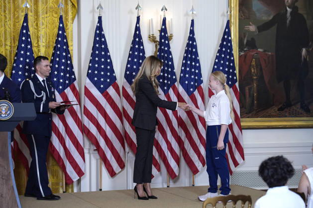 Melania Trump on AI champions awards - Washington US First lady Melania Trump participates in the Presidential Artificial Intelligence Challenge National Champion Awards Ceremony in the East Room at the White House in Washington on June 9, 2026. Photo by Yuri Gripas ABACAPRESS.COM Washington DC United States Copyright: xGripasxYuri ABACAx