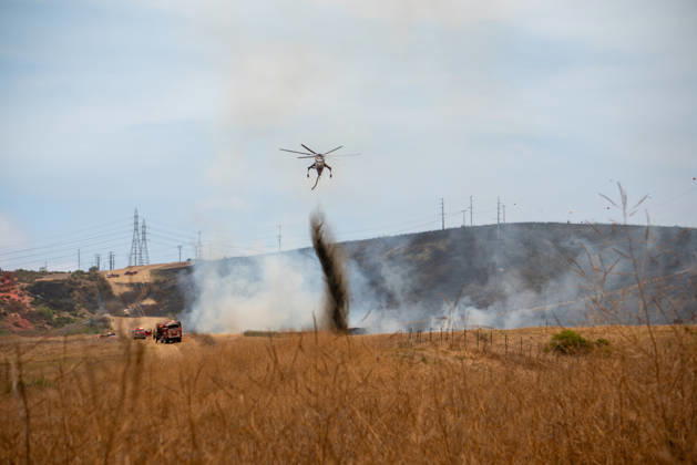 June 10, 2026, Oceanside, California, USA: Fire crews battle the November Fire off Foussat Rd. in Oceanside, California, on June 10, 2026. Multiple resources were called to subdue the nearly 850 acre fire that borders Camp Pendleton and the Whelan Lake Audubon Society Preserve. Oceanside USA - ZUMAg219 20260610_znp_g219_002 Copyright: xJakexLeexGreenx