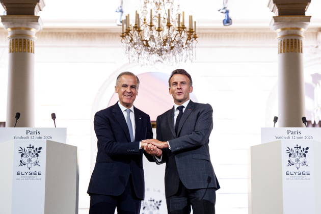 June 12, 2026, Paris, France: Canadian Prime Minister Mark Carney, left, and French President Emmanuel Macron shake hands after giving remarks at the Palais de löÄÃ Elysee in Paris, on Friday, June 12, 2026. Paris France  - ZUMAc35_ 20260612_zaf_c35_071 Copyright: xChristopherxKatsarovx