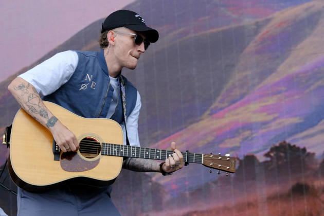 June 20, 2026, Newport, United Kingdom: Scottish singer songwriter Nathan Evans born Nathan Alexander Evans, performing live on stage with The Saint PHNX Band at the Isle of Wight festival. He first gained fame in 2020 by posting videos of himself singing sea shanties on TikTok. In 2021, he released a version of the folk song Wellerman which peaked at the top of the UK Singles Chart. The Saint PHNX Band is currently Nathan Evans Lead vocals and acoustic guitar., Stevie Jukes Lead vocals, guitar, and bass, Alan Jukes Backing vocals, drums, and percussion Newport United Kingdom - ZUMAs197 20260620_aaa_s197_150 Copyright: xDawnxFletcher-Parkx