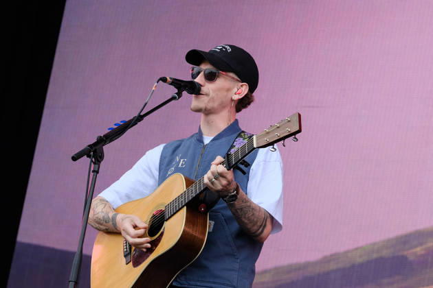 June 20, 2026, Newport, United Kingdom: Scottish singer songwriter Nathan Evans born Nathan Alexander Evans, performing live on stage with The Saint PHNX Band at the Isle of Wight festival. He first gained fame in 2020 by posting videos of himself singing sea shanties on TikTok. In 2021, he released a version of the folk song Wellerman which peaked at the top of the UK Singles Chart. The Saint PHNX Band is currently Nathan Evans Lead vocals and acoustic guitar., Stevie Jukes Lead vocals, guitar, and bass, Alan Jukes Backing vocals, drums, and percussion Newport United Kingdom - ZUMAs197 20260620_aaa_s197_151 Copyright: xDawnxFletcher-Parkx