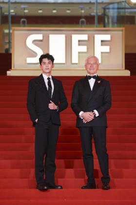 SHANGHAI, CHINA - JUNE 20: Actor Leo Wu Lei (L) arrives at the red carpet of the closing ceremony for the 28th Shanghai International Film Festival on June 20, 2026 in Shanghai, China.  Copyright: xVCGx 111649393032