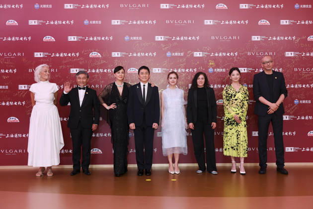 SHANGHAI, CHINA - JUNE 20: Jury members actor Tony Leung Chiu-wai and his wife Carina Lau Kar-ling, producer Dora Bouchoucha Fourati, director Guan Hu, director Aktan Abdykalykov, director-screenwriter Dea Kulumbegashvili, screenwriter Fernanda Valadez and actress Xin Zhilei arrive at the red carpet of the closing ceremony for the 28th Shanghai International Film Festival on June 20, 2026 in Shanghai, China.  Copyright: xVCGx 111649394729