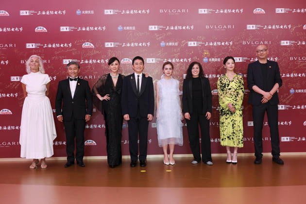 SHANGHAI, CHINA - JUNE 20: Jury members actor Tony Leung Chiu-wai and his wife Carina Lau Kar-ling, producer Dora Bouchoucha Fourati, director Guan Hu, director Aktan Abdykalykov, director-screenwriter Dea Kulumbegashvili, screenwriter Fernanda Valadez and actress Xin Zhilei arrive at the red carpet of the closing ceremony for the 28th Shanghai International Film Festival on June 20, 2026 in Shanghai, China.  Copyright: xVCGx 111649394734