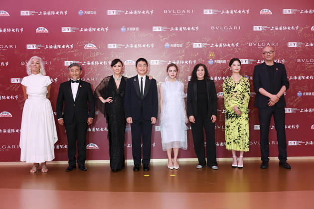 SHANGHAI, CHINA - JUNE 20: Jury members actor Tony Leung Chiu-wai and his wife Carina Lau Kar-ling, producer Dora Bouchoucha Fourati, director Guan Hu, director Aktan Abdykalykov, director-screenwriter Dea Kulumbegashvili, screenwriter Fernanda Valadez and actress Xin Zhilei arrive at the red carpet of the closing ceremony for the 28th Shanghai International Film Festival on June 20, 2026 in Shanghai, China.  Copyright: xVCGx 111649394736