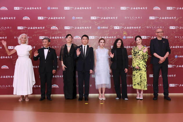 SHANGHAI, CHINA - JUNE 20: Jury members actor Tony Leung Chiu-wai and his wife Carina Lau Kar-ling, producer Dora Bouchoucha Fourati, director Guan Hu, director Aktan Abdykalykov, director-screenwriter Dea Kulumbegashvili, screenwriter Fernanda Valadez and actress Xin Zhilei arrive at the red carpet of the closing ceremony for the 28th Shanghai International Film Festival on June 20, 2026 in Shanghai, China.  Copyright: xVCGx 111649394741