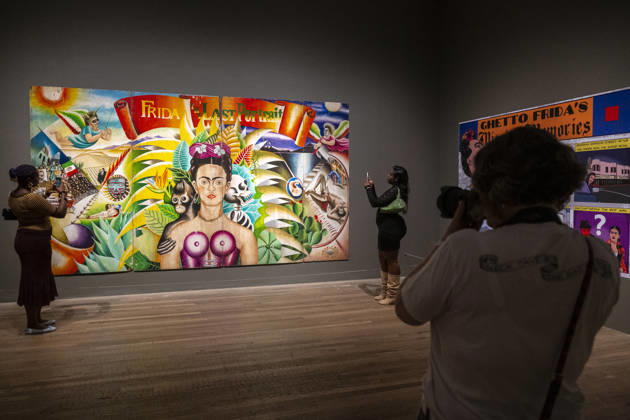 June 22, 2026, London, London, UK: LONDON, UK. Staff with Ã¢â‚¬ËœFrida the Last PortraitÃ¢â‚¬â ¢, 1985, by Marcos Raya at a preview of Frida: The Making of an Icon, a new exhibition at Tate Modern tracing Mexican painterÃ¢â‚¬â ¢s KahloÃ¢â‚¬â ¢s transformation from relatively unknown painter to global cultural phenomenon. Over 30 original works by Frida Kahlo alongside other works are on show runs 25 June 2026 to 3 January 2027. London UK  - ZUMAl94_ 20260622_zaf_l94_046 Copyright: xStephenxChungx