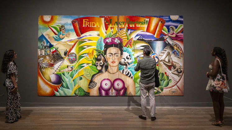 June 22, 2026, London, London, UK: LONDON, UK. Staff with Ã¢â‚¬ËœFrida the Last PortraitÃ¢â‚¬â ¢, 1985, by Marcos Raya at a preview of Frida: The Making of an Icon, a new exhibition at Tate Modern tracing Mexican painterÃ¢â‚¬â ¢s KahloÃ¢â‚¬â ¢s transformation from relatively unknown painter to global cultural phenomenon. Over 30 original works by Frida Kahlo alongside other works are on show runs 25 June 2026 to 3 January 2027. London UK  - ZUMAl94_ 20260622_zaf_l94_048 Copyright: xStephenxChungx