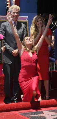 Actress Molly Shannon reacts during an unveiling ceremony honoring her with the 2,850th star on the Hollywood Walk of Fame in Los Angeles on Monday, June 22 2026. Looking on are Will Ferrell and Bonnie Britton.  LAP2026062204 JIMxRUYMEN
