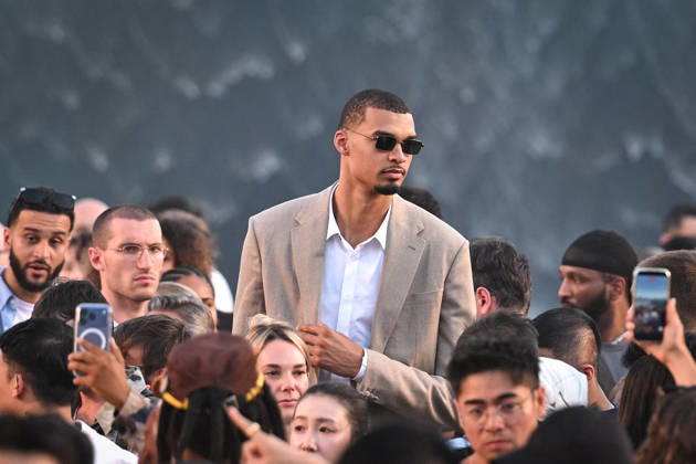 PFW - Louis Vuitton Runway in Paris FA French basketball player Victor Wembanyama attends the Spring Summer 2027 collection by US designer Pharrell Williams for Louis Vuitton during the Paris Fashion Week, on June 23, 2026. Photo by Firas Abdullah ABACAPRESS.COM Paris Ile-de-France France  Copyright: xAbdullahxFiras ABACAx