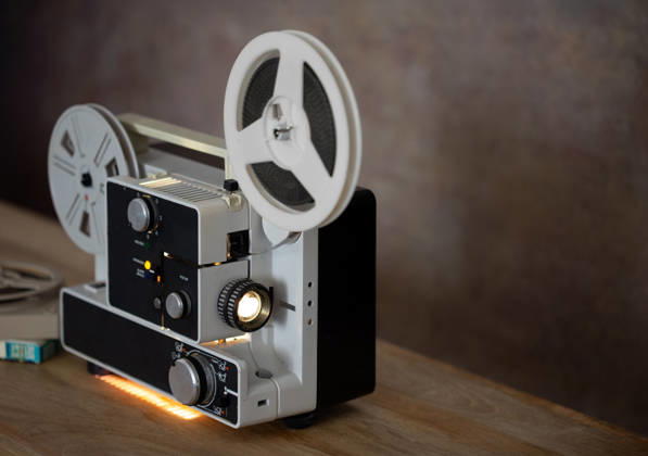 Vintage Super 8 Film Projector at 45 Degree Angle with Illuminated Seville, Andalusia, Spain R_CAKO260618-2056981-01