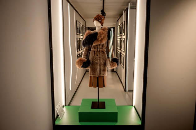 Exhibition: Fashion in Light 1955 1975 ROME, ITALY - JUNE 25: Karl Lagerfeld for Fendi, Ensemble comprising overcoat, skirt and hat in wool, Autumn Winter 1973 74, Label: Fendi Rome, astrakhan, fox, wool, bone, during the Exhibition Fashion in Light 1955 1975, Rome: between glamour and industrial innovation, featuring cinema, style, the great fashion designers, timeless brands, and the stars of the silver screen and haute couture, at the Capitoline Museums, Centrale Montemartini on June 25, 2026 in Rome, Italy. Rome Italy Copyright: xStefanoxMontesix