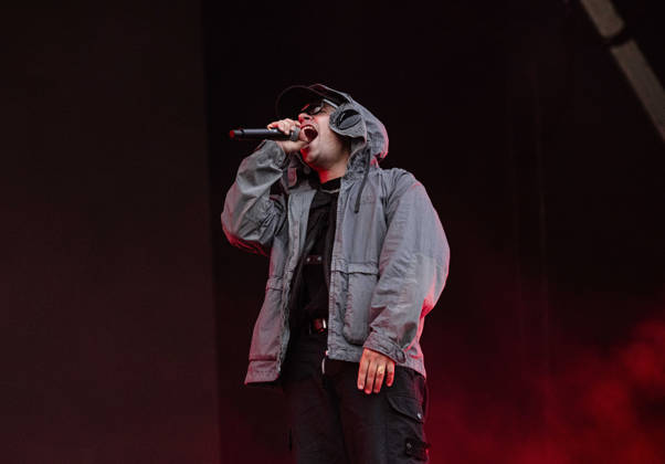 Kneecap performing live at Crystal Palace Park, London 27 June 2026 Kneecap performing live at Crystal Palace Park, London 27 June 2026 Moglai Bap (Naoise O Caireallai) - rapper, vocals Kneecap are an Irish hip-hop trio. They rap in a mixture of English and Irish. Their first single C.E.A.R.T.A. (cearta is Irish for rights ) was released in ˜17, followed by their mixtape, 3CAG, in ˜18. Their first studio album, Fine Art, was released in ˜24 Their second studio album, Fenian, was released in ˜26. The group has been at the centre of public debates about free speech and the expression of political opinions within Ireland and the UK. Their themes focus on working class, youth culture, Irish republicanism and Irish language rights Copyright: xDafyddxOwenx xDafyddxOwenx-xB5377x xAvalonx 1112995629