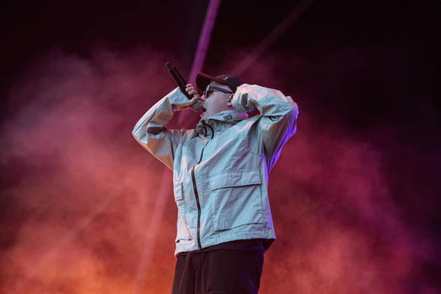 Kneecap performing live at Crystal Palace Park, London 27 June 2026 Kneecap performing live at Crystal Palace Park, London 27 June 2026 Mo Chara (Liam Og O hAnnaidh) - rapper, vocals Kneecap are an Irish hip-hop trio. They rap in a mixture of English and Irish. Their first single C.E.A.R.T.A. (cearta is Irish for rights ) was released in ˜17, followed by their mixtape, 3CAG, in ˜18. Their first studio album, Fine Art, was released in ˜24 Their second studio album, Fenian, was released in ˜26. The group has been at the centre of public debates about free speech and the expression of political opinions within Ireland and the UK. Their themes focus on working class, youth culture, Irish republicanism and Irish language rights. In Copyright: xDafyddxOwenx xDafyddxOwenx-xB5377x xAvalonx 1112996319