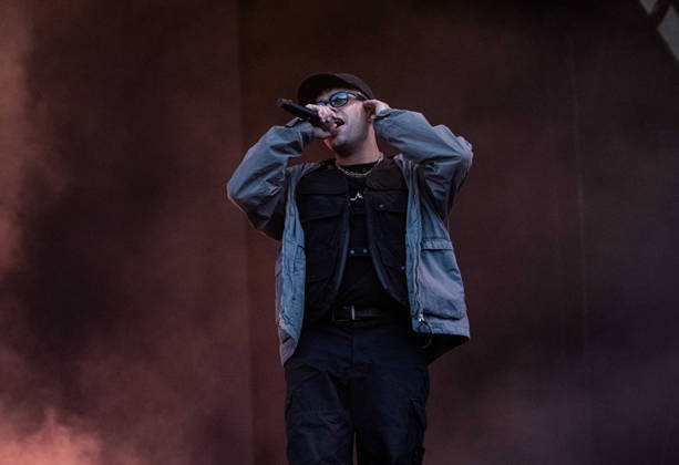 Kneecap performing live at Crystal Palace Park, London 27 June 2026 Kneecap performing live at Crystal Palace Park, London 27 June 2026 Moglai Bap (Naoise O Caireallai) - rapper, vocals Kneecap are an Irish hip-hop trio. They rap in a mixture of English and Irish. Their first single C.E.A.R.T.A. (cearta is Irish for rights ) was released in ˜17, followed by their mixtape, 3CAG, in ˜18. Their first studio album, Fine Art, was released in ˜24 Their second studio album, Fenian, was released in ˜26. The group has been at the centre of public debates about free speech and the expression of political opinions within Ireland and the UK. Their themes focus on working class, youth culture, Irish republicanism and Irish language rights Copyright: xDafyddxOwenx xDafyddxOwenx-xB5377x xAvalonx 1112996381