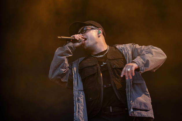 Kneecap performing live at Crystal Palace Park, London 27 June 2026 Kneecap performing live at Crystal Palace Park, London 27 June 2026 Moglai Bap (Naoise O Caireallai) - rapper, vocals Kneecap are an Irish hip-hop trio. They rap in a mixture of English and Irish. Their first single C.E.A.R.T.A. (cearta is Irish for rights ) was released in ˜17, followed by their mixtape, 3CAG, in ˜18. Their first studio album, Fine Art, was released in ˜24 Their second studio album, Fenian, was released in ˜26. The group has been at the centre of public debates about free speech and the expression of political opinions within Ireland and the UK. Their themes focus on working class, youth culture, Irish republicanism and Irish language rights Copyright: xDafyddxOwenx xDafyddxOwenx-xB5377x xAvalonx 1112996396