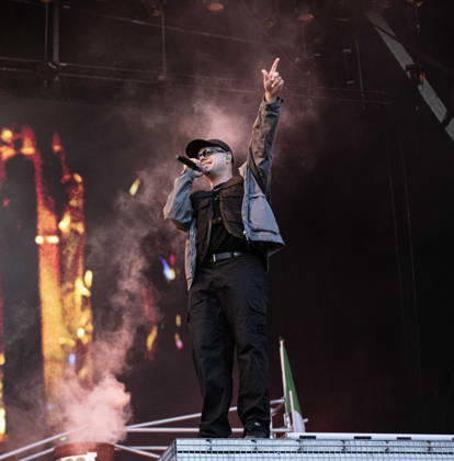 Kneecap performing live at Crystal Palace Park, London 27 June 2026 Kneecap performing live at Crystal Palace Park, London 27 June 2026 Moglai Bap (Naoise O Caireallai) - rapper, vocals Kneecap are an Irish hip-hop trio. They rap in a mixture of English and Irish. Their first single C.E.A.R.T.A. (cearta is Irish for rights ) was released in ˜17, followed by their mixtape, 3CAG, in ˜18. Their first studio album, Fine Art, was released in ˜24 Their second studio album, Fenian, was released in ˜26. The group has been at the centre of public debates about free speech and the expression of political opinions within Ireland and the UK. Their themes focus on working class, youth culture, Irish republicanism and Irish language rights Copyright: xDafyddxOwenx xDafyddxOwenx-xB5377x xAvalonx 1112996440