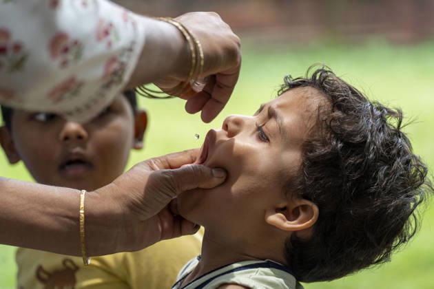 June 28, 2026: A health worker administers oral polio vaccine drops to a child during a immunization campaign, in Guwahati, India on 28 June 2026. - ZUMAt232 20260628_zip_t232_003 Copyright: xDavidxTalukdarx