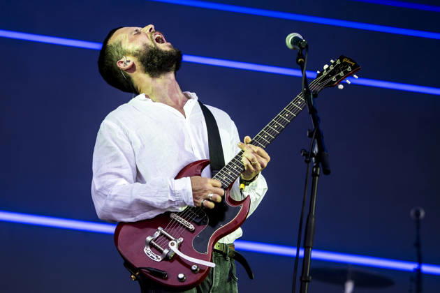 White Lies live at Tinderbox 2026 Odense, Denmark. 27th, June 2026. The English indie rock and post-punk band White Lies performs a live concert during the Danish music festival Tinderbox 2026 in Odense. Here singer and guitarist Harry McVeigh is seen live on stage. Denmark, Odense  Copyright: xGonzalesxPhoto LassexLagonix