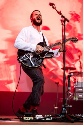 White Lies live at Tinderbox 2026 Odense, Denmark. 27th, June 2026. The English indie rock and post-punk band White Lies performs a live concert during the Danish music festival Tinderbox 2026 in Odense. Here singer and guitarist Harry McVeigh is seen live on stage. Denmark, Odense  Copyright: xGonzalesxPhoto LassexLagonix