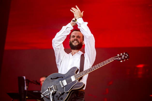White Lies live at Tinderbox 2026 Odense, Denmark. 27th, June 2026. The English indie rock and post-punk band White Lies performs a live concert during the Danish music festival Tinderbox 2026 in Odense. Here singer and guitarist Harry McVeigh is seen live on stage. Denmark, Odense  Copyright: xGonzalesxPhoto LassexLagonix