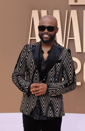 Travis Malloy arrives on the red carpet for 26th annual BET Awards live telecast at the Peacock Theater in Los Angeles on Sunday, June 28, 2026. The BET Awards honors Black entertainers and other people of color in music, film, sports and philanthropy.  LAP20260628121 GREGxGRUDT