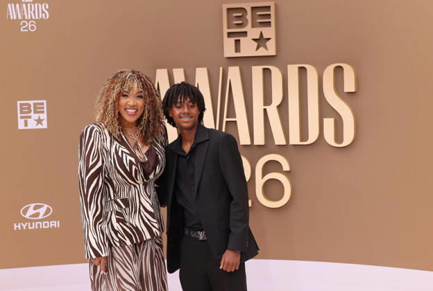 (L-R) Kym Whitley and Joshua Whitley arrive on the red carpet for 26th annual BET Awards live telecast at the Peacock Theater in Los Angeles on Sunday, June 28, 2026. The BET Awards honors Black entertainers and other people of color in music, film, sports and philanthropy.  LAP20260628189 GREGxGRUDT