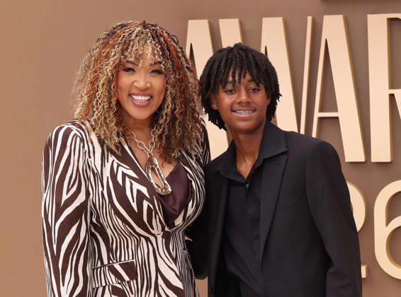 (L-R) Kym Whitley and Joshua Whitley arrive on the red carpet for 26th annual BET Awards live telecast at the Peacock Theater in Los Angeles on Sunday, June 28, 2026. The BET Awards honors Black entertainers and other people of color in music, film, sports and philanthropy.  LAP20260628190 GREGxGRUDT