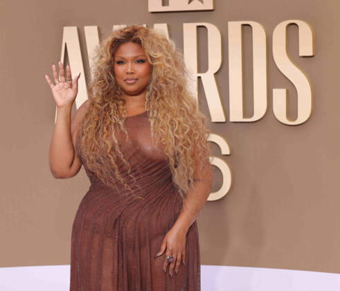 Lizzo arrives on the red carpet for 26th annual BET Awards live telecast at the Peacock Theater in Los Angeles on Sunday, June 28, 2026. The BET Awards honors Black entertainers and other people of color in music, film, sports and philanthropy.  LAP20260628285 GREGxGRUDT