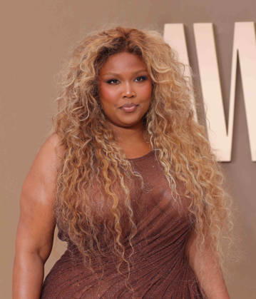 Lizzo arrives on the red carpet for 26th annual BET Awards live telecast at the Peacock Theater in Los Angeles on Sunday, June 28, 2026. The BET Awards honors Black entertainers and other people of color in music, film, sports and philanthropy.  LAP20260628292 GREGxGRUDT