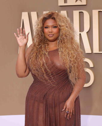 Lizzo arrives on the red carpet for 26th annual BET Awards live telecast at the Peacock Theater in Los Angeles on Sunday, June 28, 2026. The BET Awards honors Black entertainers and other people of color in music, film, sports and philanthropy.  LAP20260628293 GREGxGRUDT