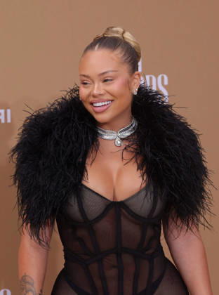 Latto arrives on the red carpet for 26th annual BET Awards live telecast at the Peacock Theater in Los Angeles on Sunday, June 28, 2026. The BET Awards honors Black entertainers and other people of color in music, film, sports and philanthropy.  LAP20260628301 GREGxGRUDT