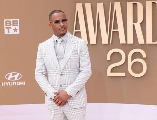 T.I. arrives on the red carpet for 26th annual BET Awards live telecast at the Peacock Theater in Los Angeles on Sunday, June 28, 2026. The BET Awards honors Black entertainers and other people of color in music, film, sports and philanthropy.  LAP20260628309 GREGxGRUDT