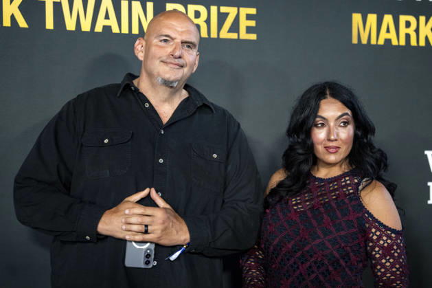 Sen. John Fetterman, D-PA, and Gisele Barreto Fetterman arrive on the red carpet before the 27th Mark Twain Prize for American Humor Award at the Kennedy Center for the Performing Arts in Washington DC on Sunday, June 28, 2026.  WAP20260628322 BONNIExCASH