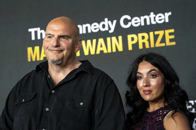 Sen. John Fetterman, D-PA, and Gisele Barreto Fetterman arrive on the red carpet before the 27th Mark Twain Prize for American Humor Award at the Kennedy Center for the Performing Arts in Washington DC on Sunday, June 28, 2026.  WAP20260628323 BONNIExCASH