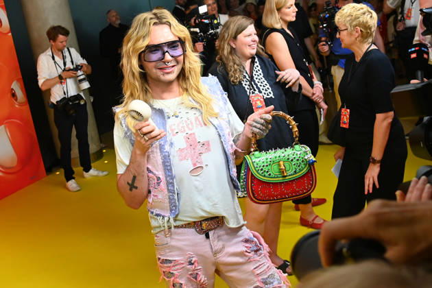 Bill KAULITZ mit Gucci Tasche und Handventilator. 43.Filmfest Muenchen Deutschlandpremiere MINIONS UND MONSTER am 28.06.2026 im Mathaeser Filmpalast.