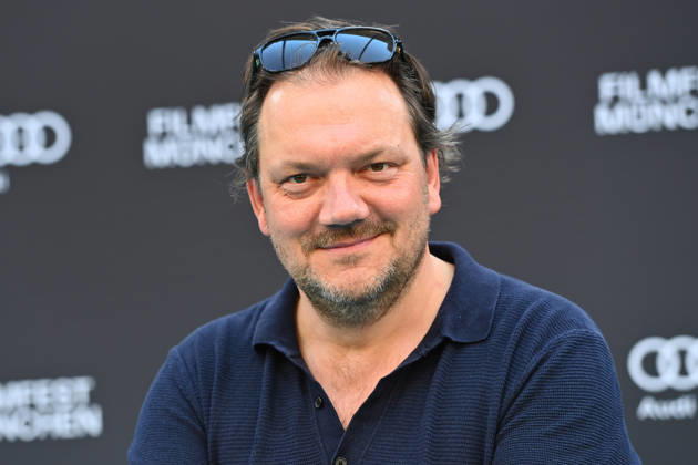 Charly HUEBNER (Schauspieler), Einzelbild,angeschnittenes Einzelmotiv,Portraet,Portrait,Porträt. 43.Filmfest Muenchen Premiere SPAZIERGANG NACH SYRAKUS am 28.06.2026 Deutsches Theater.