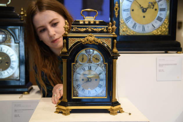 Bonhams Classics Week Sales at Bonhams, London, UK - 29 June 2026 A staff member views A fine and rare mid 18th century silver- and ormolu-mounted, quarter repeating ebony table clock of small size and wonderful proportion - Barkley and Colley, Graham s Successors, London (est. £25k - £35k) which is part of Bonhams Classics Week Sales on 30th June - 2nd July at Bonhams, London, England, UK on Monday 29 June, 2026., Credit:Justin Ng Avalon UK, England, London, Bonhams Copyright: xJustinxNgx xAvalonx 1113334504