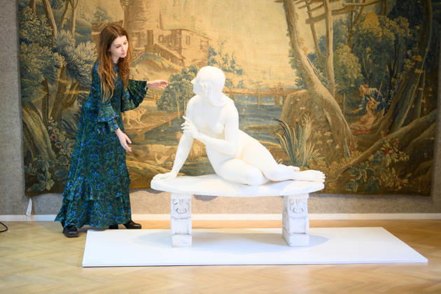 Bonhams Classics Week Sales at Bonhams, London, UK - 29 June 2026 A staff member views (background) - A Louis XV Aubusson pastoral tapestry - Mid 18th Century (est. £3k - £4k) and (foreground) A carved white marble figure of Eve listening to the voice of Adam by Edward Hodges Baily (est. £10k - £15k) which is part of Bonhams Classics Week Sales on 30th June - 2nd July at Bonhams, London, England, UK on Monday 29 June, 2026., Credit:Justin Ng Avalon UK, England, London, Bonhams Copyright: xJustinxNgx xAvalonx 1113334527